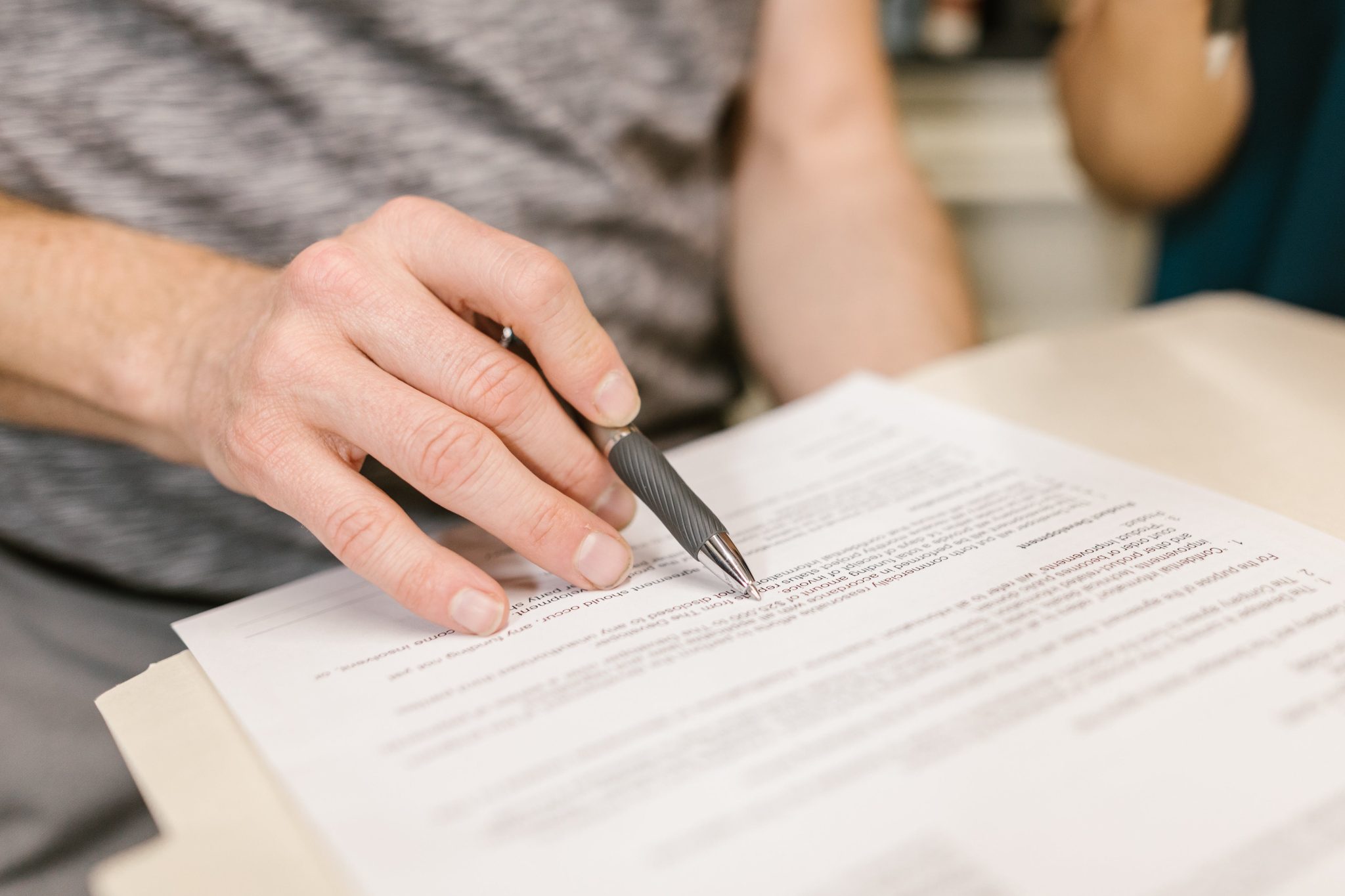 A woman reviewing divorce papers